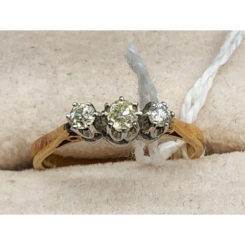 78 - 18ct yellow gold ladies ring set with three round cut diamonds. [Ring size L] [2.87Grams]