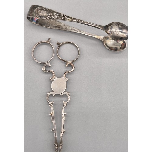 95 - 19th century English silver sugar nips/ tongs. Together with Sheffield silver sugar tongs. [53.90gra... 