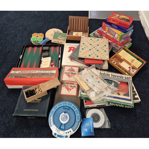 494 - A Collection of vintage board games and others; Jokari Senior popular set, Monopoly, Scrabble, Risk,... 