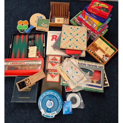 494 - A Collection of vintage board games and others; Jokari Senior popular set, Monopoly, Scrabble, Risk,... 