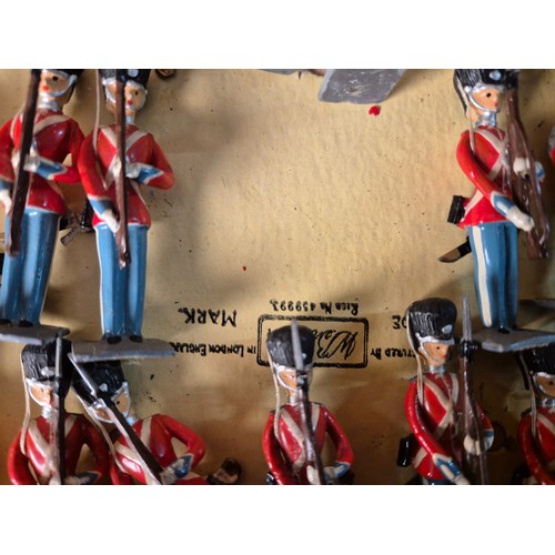 409 - Two Boxes of Britain's lead hand painted soldiers. 