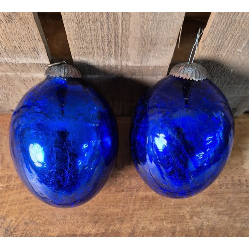 418 - A Pair of Victorian blown blue glass egg shaped Kugel bell bobbles. [15cm high]