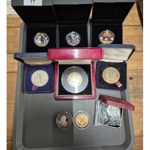 17 - A Collection of boxed mint coins; Royal Naval £5 commemorative coin, The Road to Victory coins and R... 