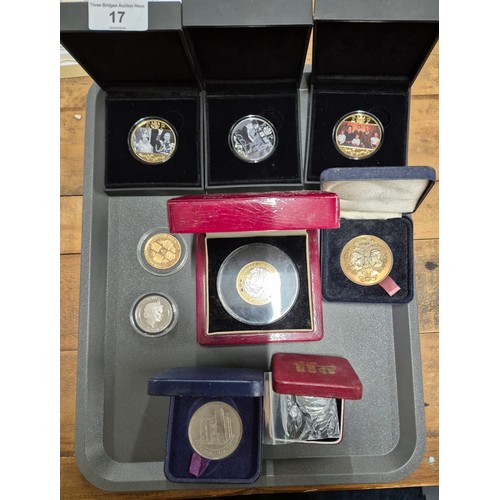 17 - A Collection of boxed mint coins; Royal Naval £5 commemorative coin, The Road to Victory coins and R... 