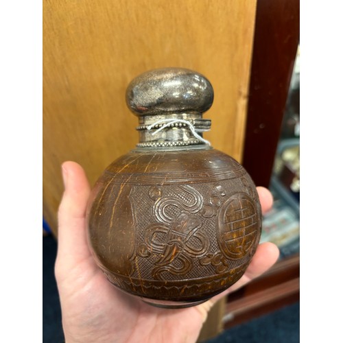 22 - Antique Japanese carved coconut sake bottle, fitted with a silver Dutch silver lid. c1920. [15cm hig... 