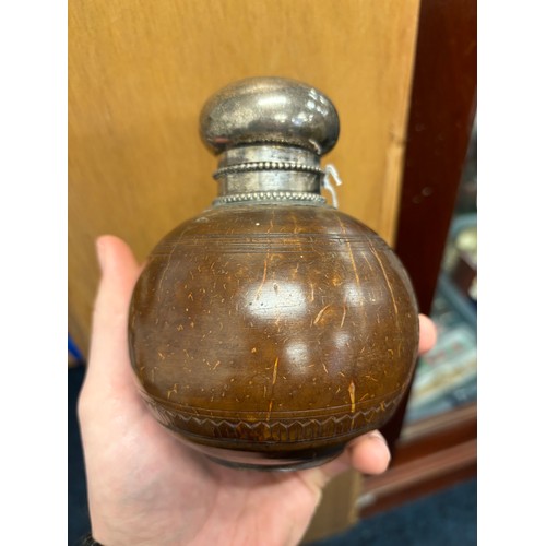 22 - Antique Japanese carved coconut sake bottle, fitted with a silver Dutch silver lid. c1920. [15cm hig... 