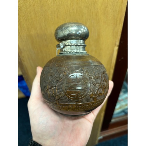 22 - Antique Japanese carved coconut sake bottle, fitted with a silver Dutch silver lid. c1920. [15cm hig... 