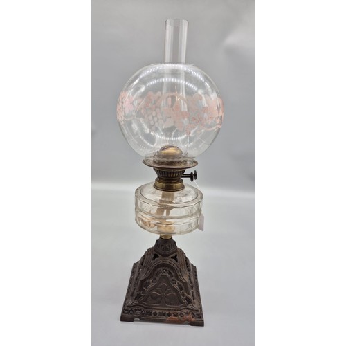 156 - Victorian table top oil lamp; Glass funnel and globe leading to a brass burner and glass shaped body... 