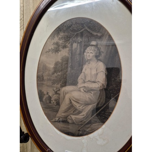 250 - 19th century engraving depicting a seated lady shepherd. Fitted in an oval form frame. [Frame- 67x52... 