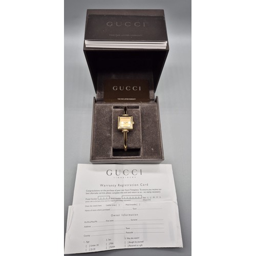 5 - Vintage Ladies Gucci 1900L Gold Plated Bangle watch. Comes with box and certificate card.