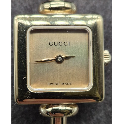 5 - Vintage Ladies Gucci 1900L Gold Plated Bangle watch. Comes with box and certificate card.