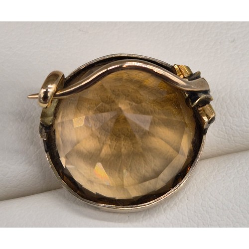 13 - Antique 9ct yellow gold and large cut citrine gem stone brooch. [1.7cm diameter] [4.56grams]