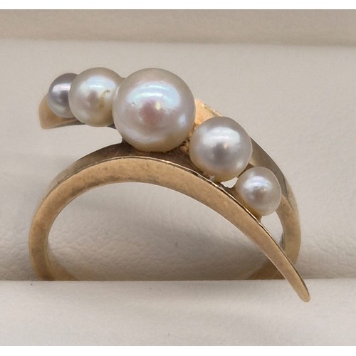 18 - 14ct yellow gold ring set with five varying sized pearls. [Ring size L 1/2] [4grams]