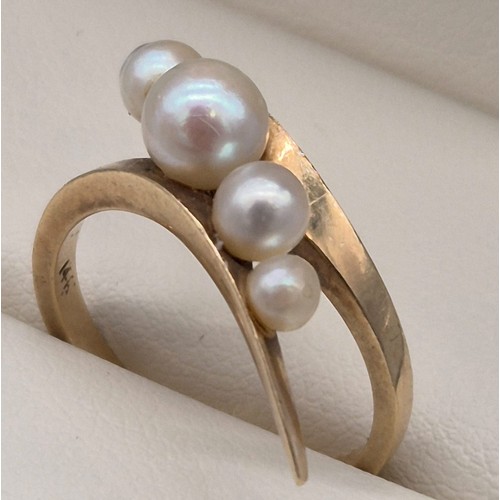 18 - 14ct yellow gold ring set with five varying sized pearls. [Ring size L 1/2] [4grams]