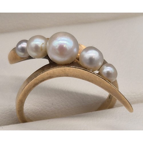 18 - 14ct yellow gold ring set with five varying sized pearls. [Ring size L 1/2] [4grams]