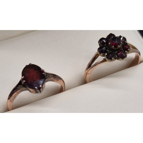 21 - Two 9ct rose gold and red glass stones rings. [Ring size L & M] [3.90grams]