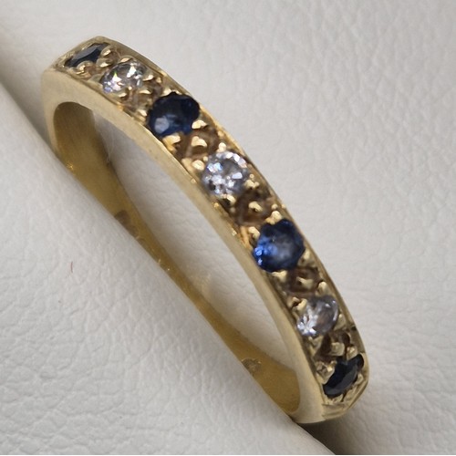 23 - 18ct yellow gold, Sapphire and Diamond gem stone ring. [Ring size J] [1.82Grams]