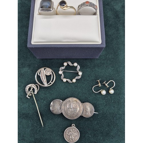 35 - A selection of silver jewellery; Queen Victoria silver coin brooch, Silver St Christopher pendant, M... 