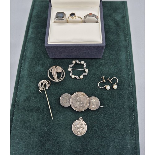 35 - A selection of silver jewellery; Queen Victoria silver coin brooch, Silver St Christopher pendant, M... 