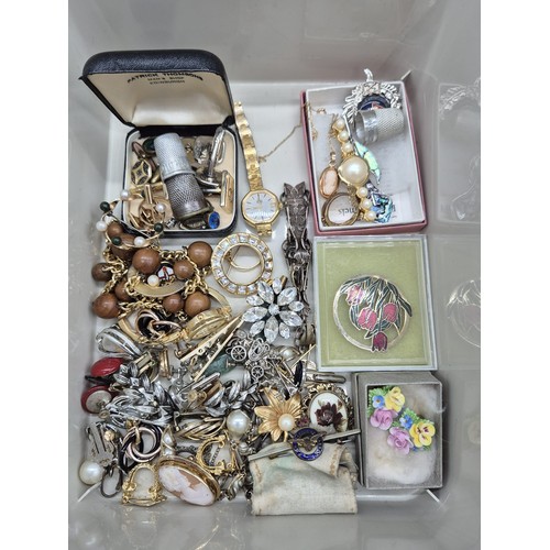 36 - Two small tubs of mixed costume jewellery; Sweetheart R.A.F Brooch and Pendant, Sarah Coventry neckl... 