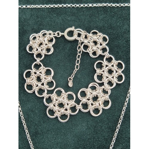 41 - Heavy contemporary Edinburgh silver ornate bracelet, matching pendant and chain.