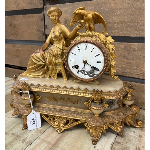 153 - 19th century French Ormolu and onyx figural mantel clock; 