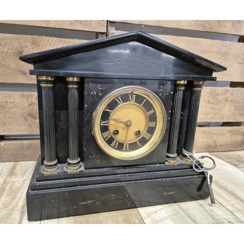 166 - Antique slate mantel clock, Comes with a key and pendulum. [Over wound] [27.5cm high]