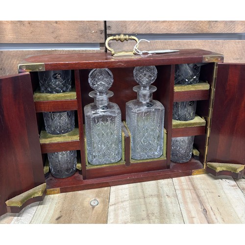 167 - Mahogany cased Tantalus crystal decanters and whisky glasses produced by Laurence- English made. Fit... 