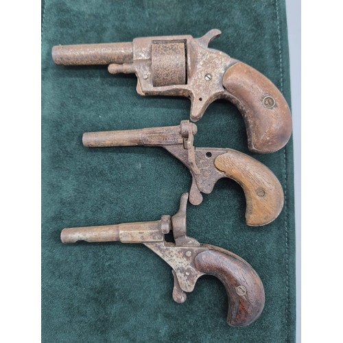 174 - Three various 19th century Muff Guns. One marked Robin Hood No1.