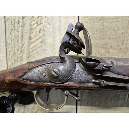 184 - 19th century military flint lock rifle. Stamped with crown GR. & TOWER. Mahogany body, steel barrel ... 