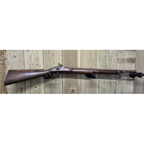 185 - 19th century cap rifle. Mahogany body and steel barrel and mechanism. Comes with original loading ro... 