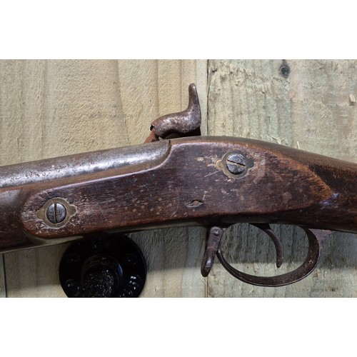 185 - 19th century cap rifle. Mahogany body and steel barrel and mechanism. Comes with original loading ro... 