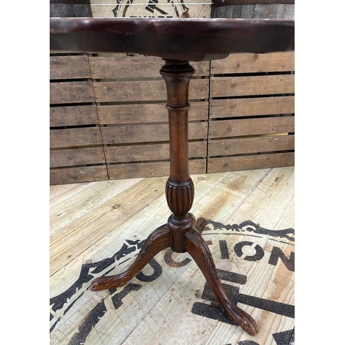 301 - Antique mahogany drop end wine table; Pie crust edge, raised on carved tri legs and single turned co... 