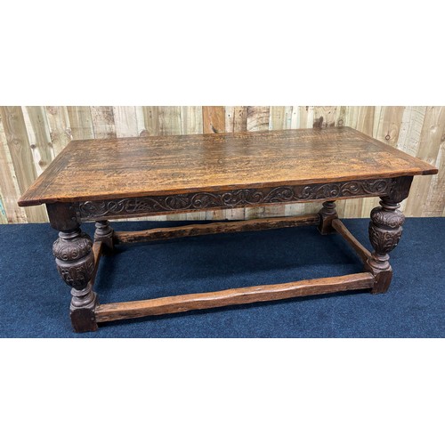 302 - 17th/ 18th century Solid oak Jacobean dining table. Rectangle top leading to carved under trim and r... 