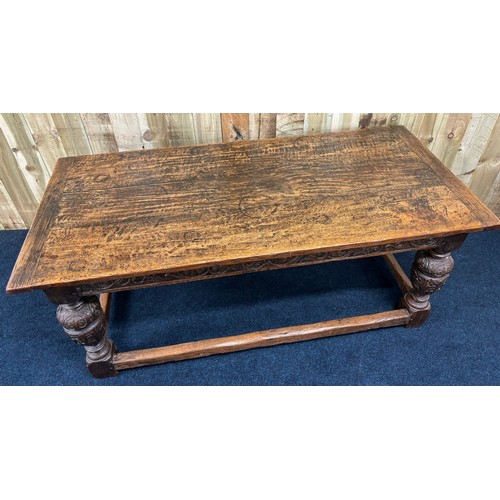 302 - 17th/ 18th century Solid oak Jacobean dining table. Rectangle top leading to carved under trim and r... 