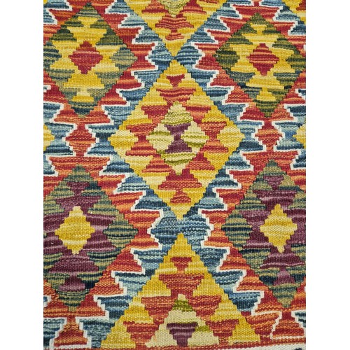 335 - Hand knotted Chobi kilim rug. [127x81cm]