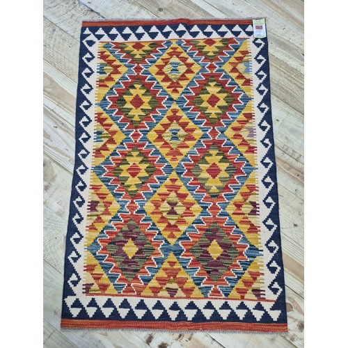 335 - Hand knotted Chobi kilim rug. [127x81cm]