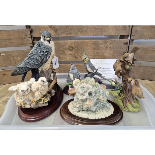 394 - Four various studio sculptures; Danbury Mint 