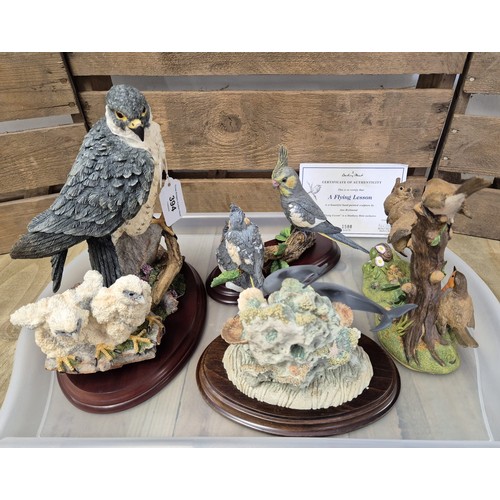 394 - Four various studio sculptures; Danbury Mint 