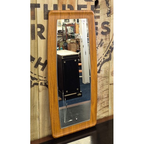 376 - Mid century Formwood mirror. [92x40cm]