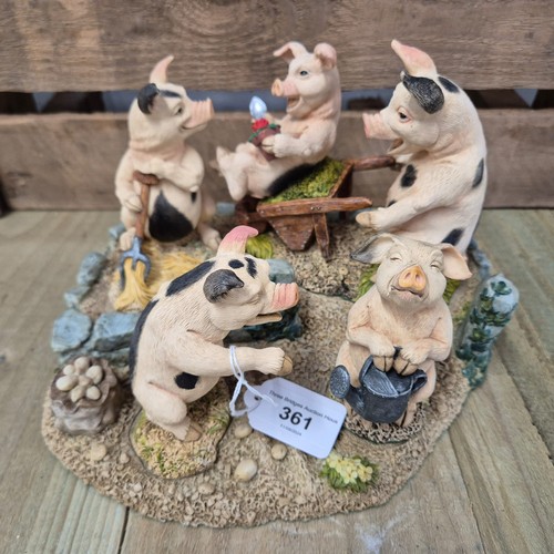 361 - Holland Studio Craft porcelain pig figures and stand. [15cm high]