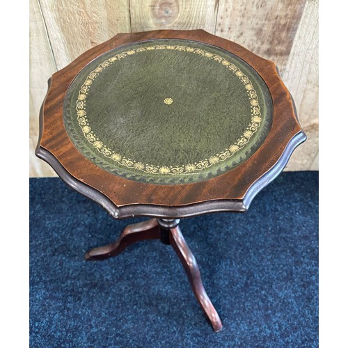 455 - Reproduction wine table fitted with green leather top. [50x37cm]