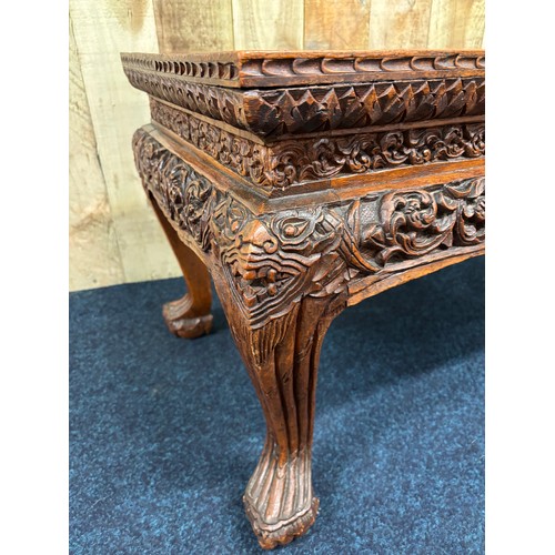 451 - Chinese hardwood coffee table, hand carved legs and trims. [51x122x49cm]