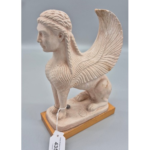 435 - A Plaster model of The Sphinx of Naxos. Fitted with a lead seal and raised on a wooden base. [25cm h... 