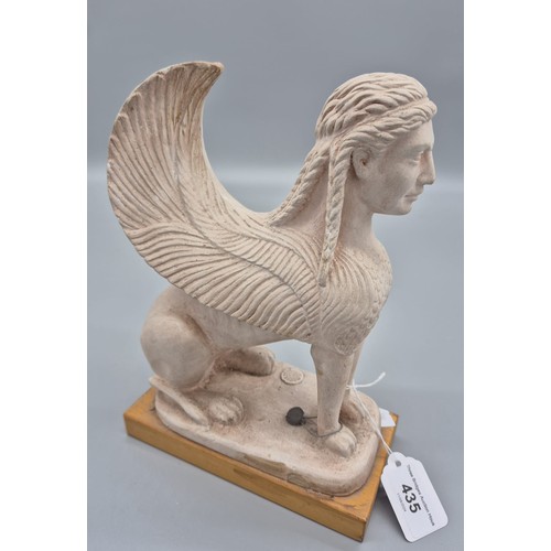 435 - A Plaster model of The Sphinx of Naxos. Fitted with a lead seal and raised on a wooden base. [25cm h... 