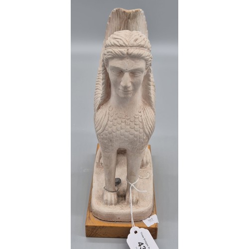 435 - A Plaster model of The Sphinx of Naxos. Fitted with a lead seal and raised on a wooden base. [25cm h... 