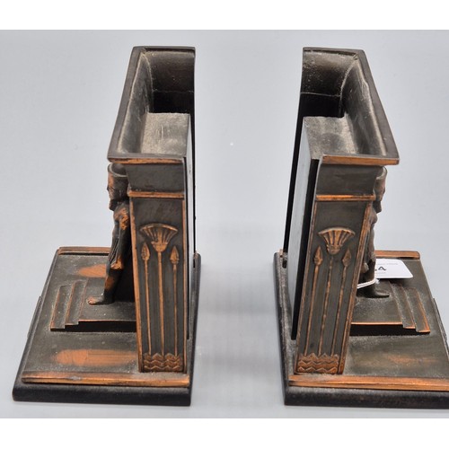 434 - A Pair of Egyptian Bronze figural bookends. Showing various Hieroglyphics, Sat upon two wooden bases... 