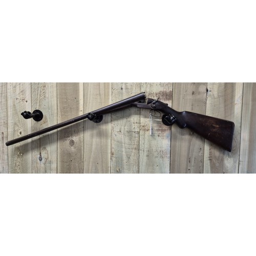 411 - Antique double barrel shotgun- Ithaca Gun Co. Comes with Deactivation Certificate.