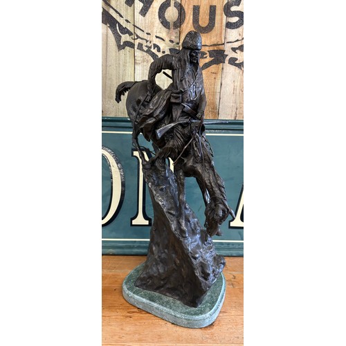 406 - After Frederic Remington 
Limited edition 24/100 patinated bronze on green marble plinth titled 