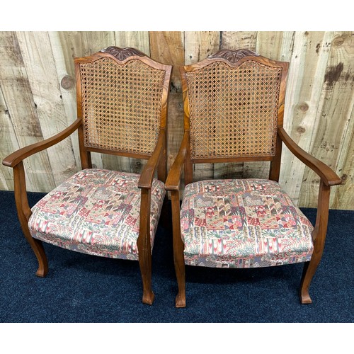 359 - A Pair of 1920's 30's bedroom armchairs. Bergère back and raised on shaped legs.